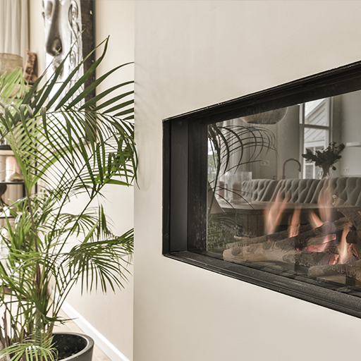 Gas fireplace insert in living room.
